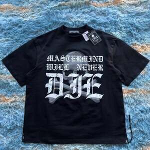 Mastermind Japan Will Never Die SS Tee  tee skull graphics.